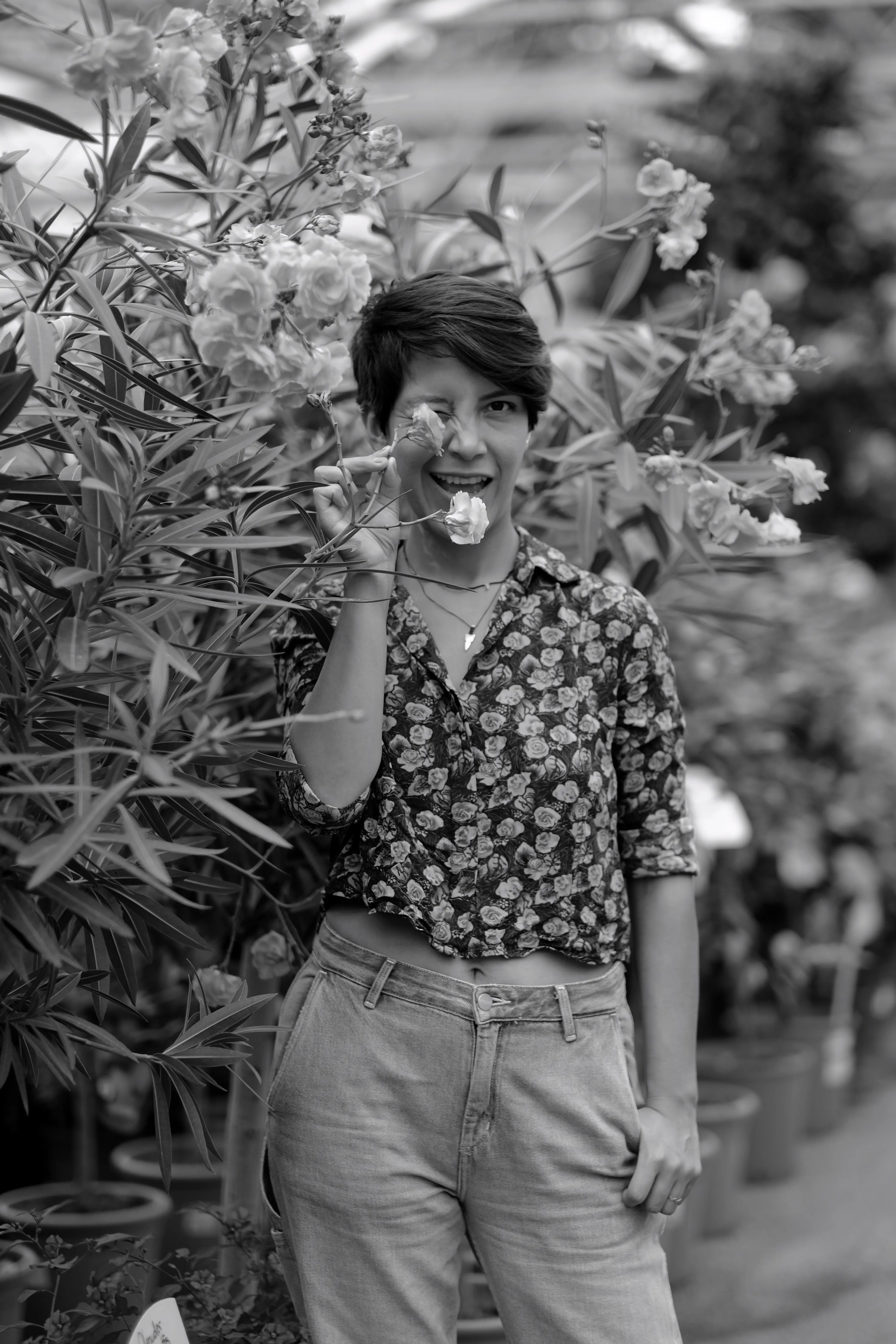 Photos of Ursula going on a walk, holding a instant camera, and exploring the city.