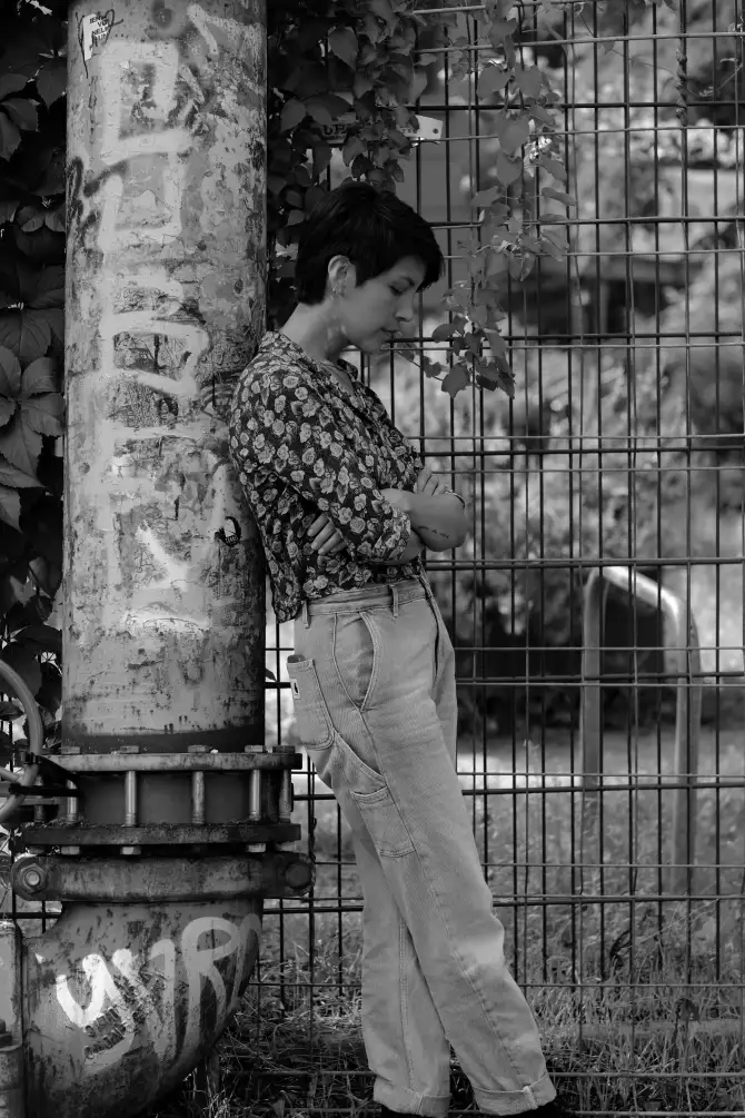 Photos of Ursula going on a walk, holding a instant camera, and exploring the city.